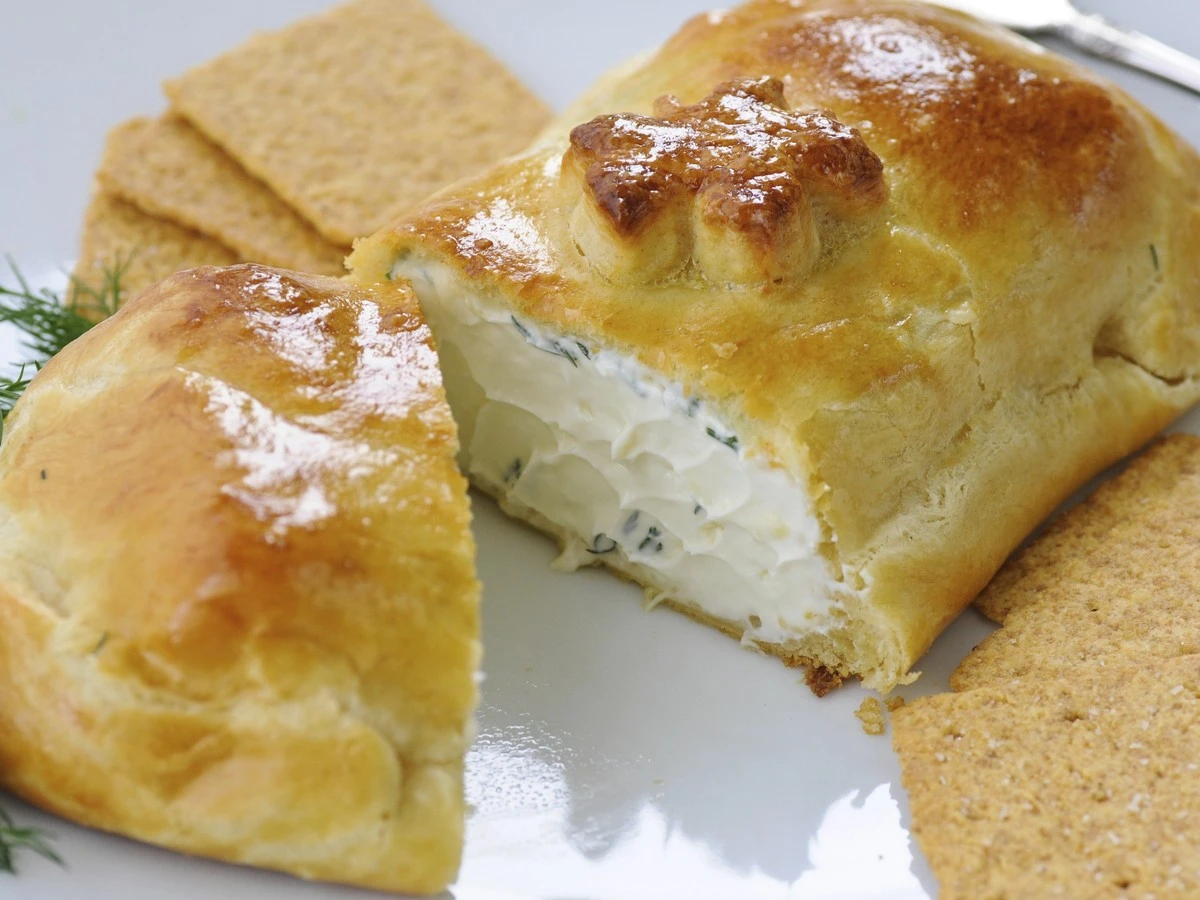 Ofenkäse: Das Geheimnis krosser Blätterteig-Taschen und cremiger Füllung - image 1
